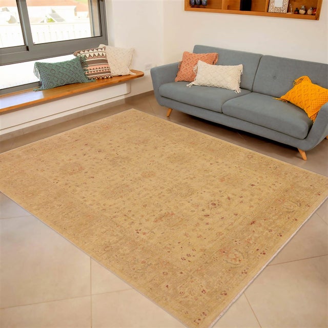 "Enhance the ambiance of your home with this magnificent Persian-influenced Turkish hand-knotted rug made by skilled...