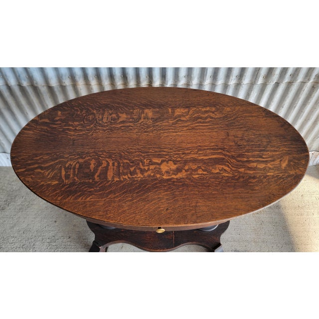 Victorian Antique Oval Library Table Tiger Oak With Column Base Circa. 1890 For Sale - Image 3 of 13