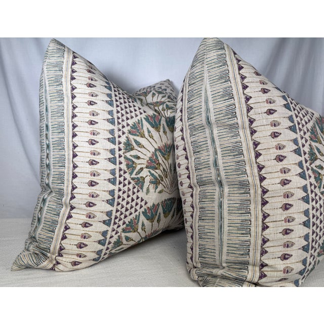 Custom pair of 22" pillows covered in Anna French "Cairo" in color eggplant. These pillows have tapered corners to prevent...
