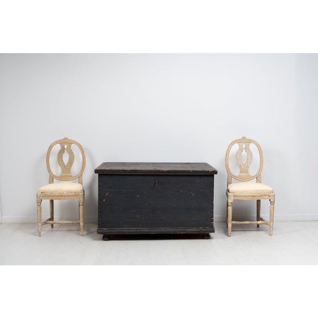 Black Swedish hope chest from the first years of the 19th century. This chest is in original, untouched condition with the...