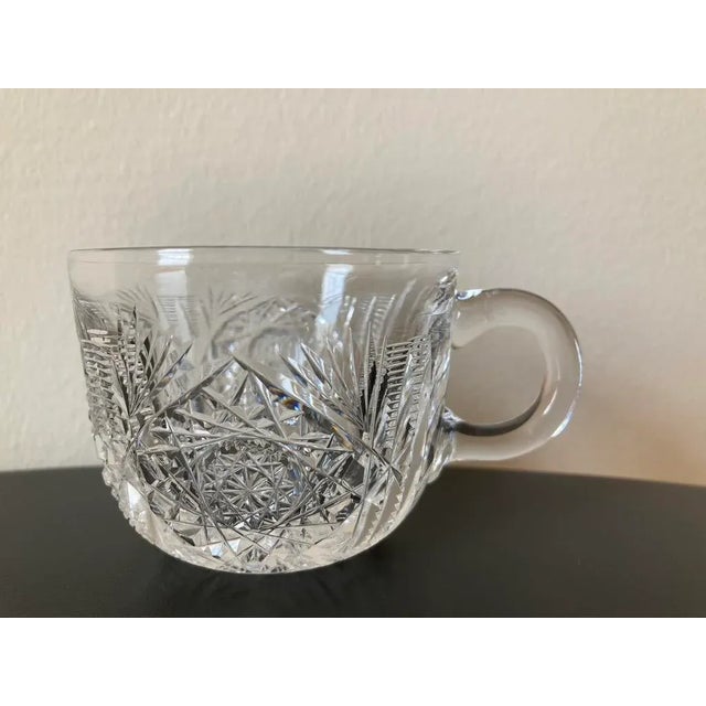 A beautiful American brilliant cut crystal punch cup, circa early 20th century, USA. Cup has intricate bevel cut shapes...