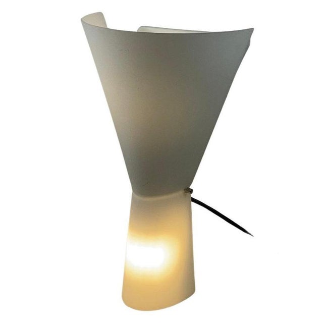 Elegant wall lamp, designed by stefano marcato for arteluce nemo under the model name alkaid. A diabolo shaped, white...