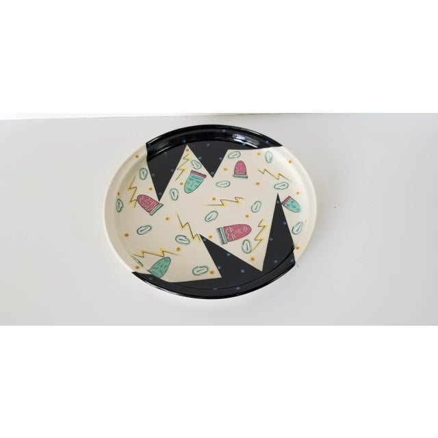 The practice artistic of hand-painted is on full display on this plate made by ceramic artist KELLY SWOPE. C,1980's . For...