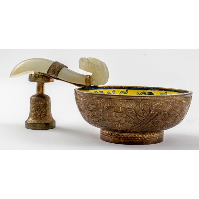 Chinese Jade Belt Hook Mounted Enamel Bowl, circular and decorated with two figures in a landscape scene with floral...