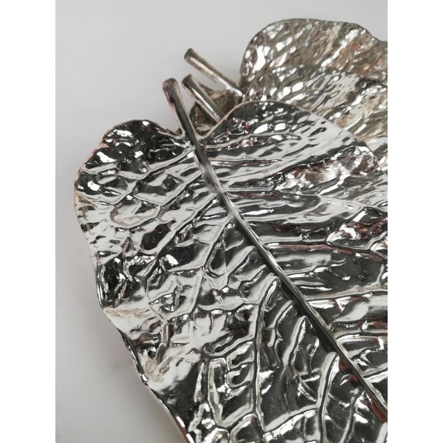 Set of 4 empty pockets or stackable ashtray. Made in Italy during the 70s and having the form of uninterated leaves. Made...