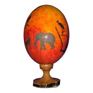 Hand-Painted African Ostrich Eggshell Mounted on a Wooden Pedestal For Sale