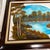 Original art lakeside fall landscape painting. Signed LW. Frame measures 25” w x 21” h, canvas measures 20” w x 16” h.