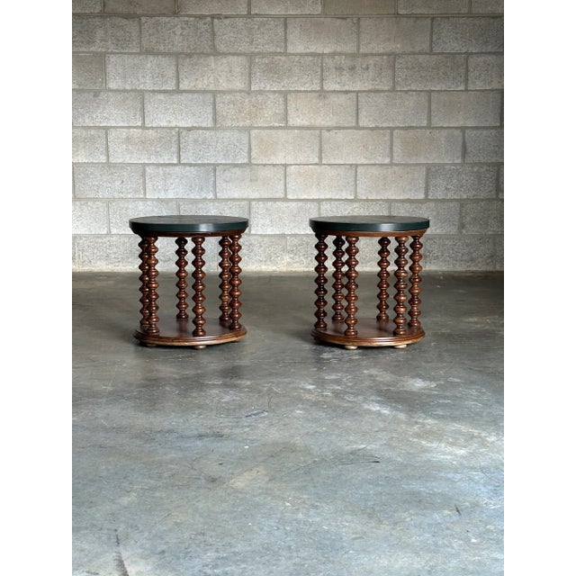 An unusual pair of end or side tables manufactured by Henredon for their Custom Folio Three line, circa 1970s. The tables...