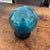 Very pretty hand-blown glass orb on a small 1” wood stand. These seem to be commonly referred to as a fishing float or...