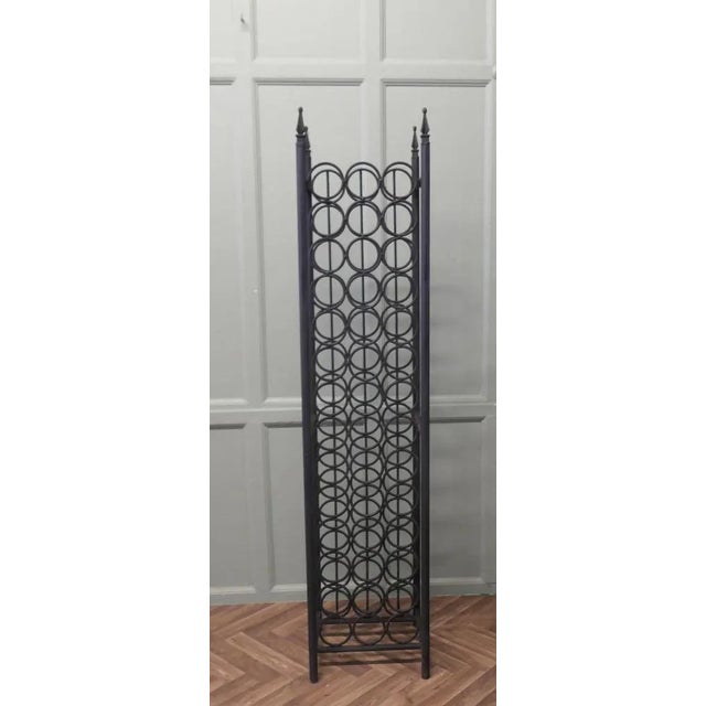Large 42 bottle Gothic Look Iron Wine Rack A very useful piece it is tall and floor standing, it holds 42 wine bottles and...