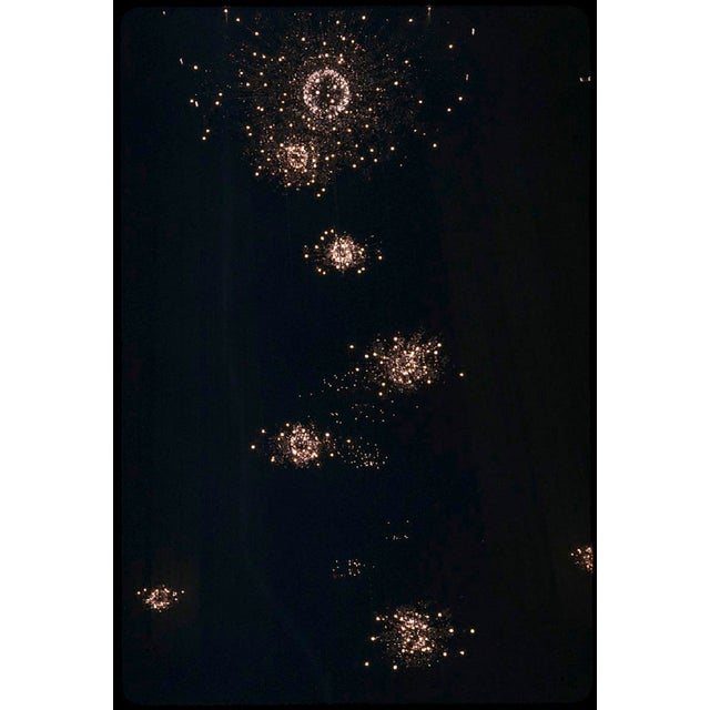 Fireworks Constellation by Toni Frissell Fireworks paint the sky at the opening of the New Metropolitan Opera, 1966. (Toni...