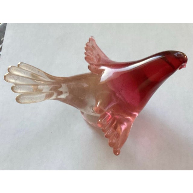 A Ruby red bird with Gold flakes infused. Not signed but appears to be work of Alfredo Barbini.
