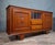 Art deco style carved oak sideboard, circa 1930. this piece is distinguished by its elegant horizontal lines and fine...