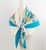 This exquisite silk scarf by Christian Dior features a floral design print in blue, lavender, and yellow colors. Christian...