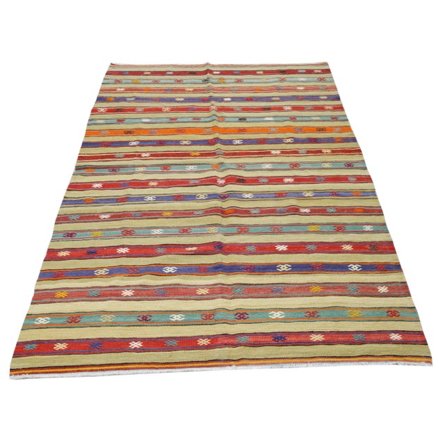 Vintage Turkish Anatolian hand knotted kilim with natural colors, soft texture and fine weave.