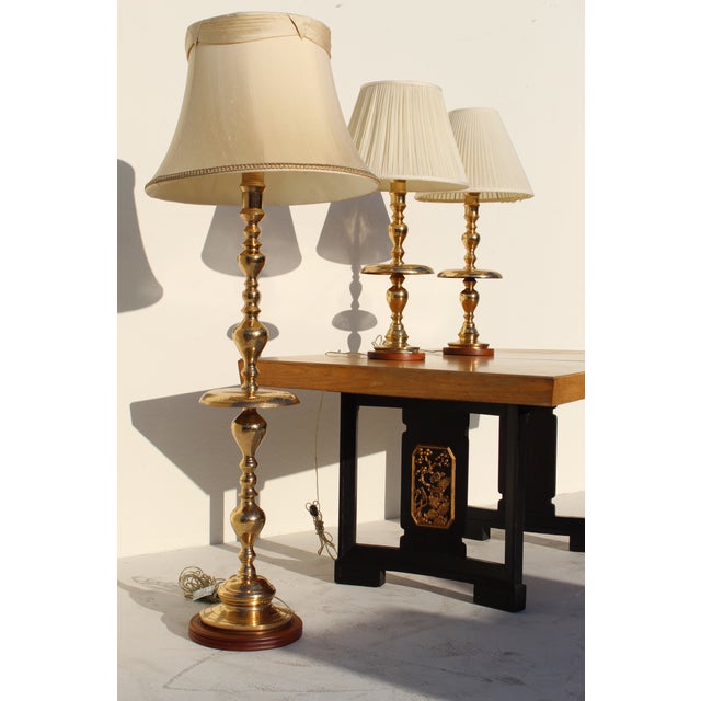 Lovely Pr of brass lamps Hollywood Regency possibly by James Mont. Recently buffed /polished and varnished to prevent...