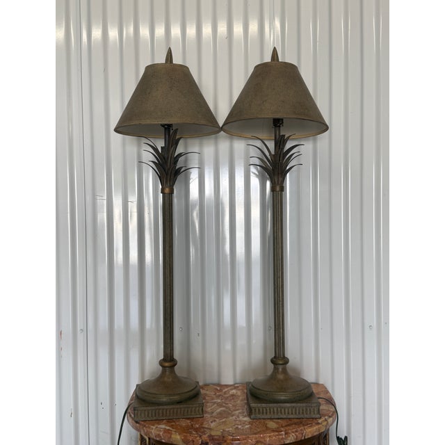 Statuesque Palm Tree Lamps with shades sold as found in good vintage condition showing noraml signs of previous use.