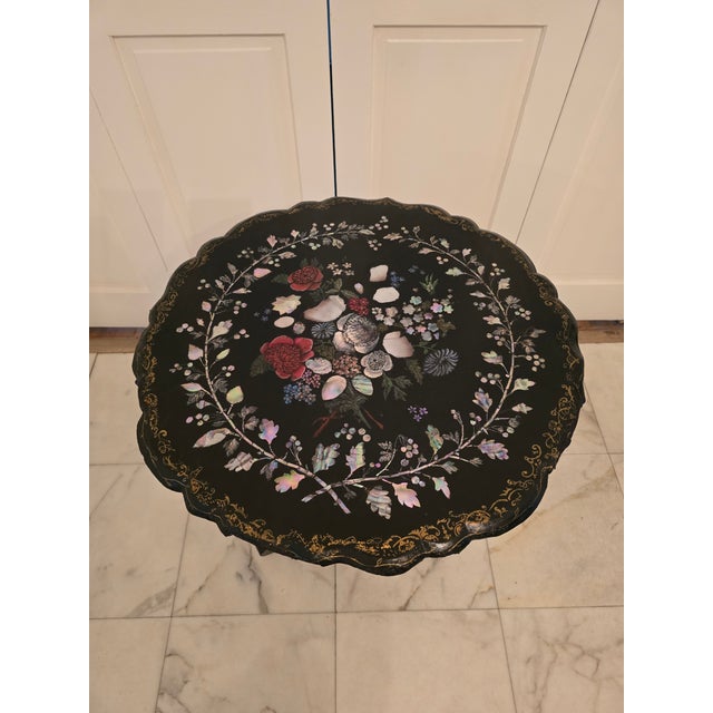 A good vintage 1960's or older exotic shell inlaid drop fold table . A very decorative side / drinks or occasional table...