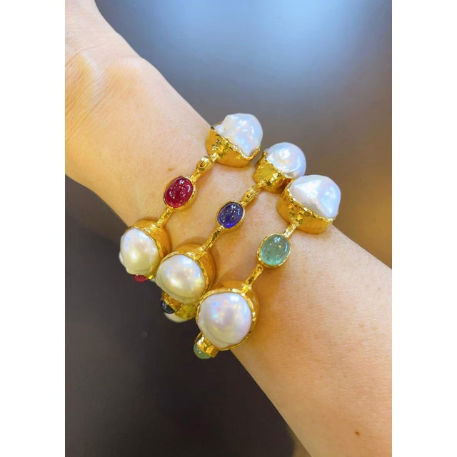 Bochic "Capri" Bangle, Ruby & South Sea Pearls set in 22 Gold & Silver Natural Red Ruby Cabochons - 9 carats in total, all...