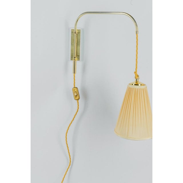 Cable in height adjustable art deco wall lamp 1920s The fabric shade is replaced ( new ) Polished and stove enameled...