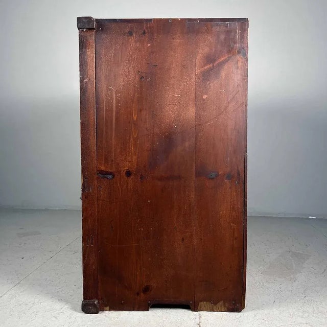 Traditional Japanese tansu from the Meiji Era, circa 1870-1890. This cabinet has storage in the upper part with two...