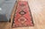 Vintage Hand-Knotted runner rug is a semi-antique vintage area rug. The '70s Eastern region of Anatolia's unique rug is...