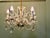 A Charming 5 Branch Venetian Style Chandelier This is a pretty quality piece, it has twisted arms in the venetian style...