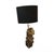 Original French piece by Maison Jansen. Black and gold block base on which two sunflowers rise. This piece has an...
