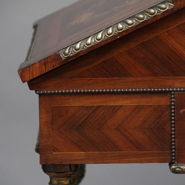 19th Century French Kingwood and gilt mounted miniature partners desk, with a middle storage section with a long lid...