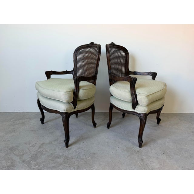 Wood Vintage French Louis XV Style Carved Walnut & Cane Back Arm Accent Chairs – A Pair For Sale - Image 7 of 12