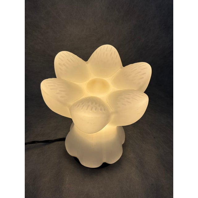 Original Glashütte Limburg table lamp from the 1970s, made of white textured opaline glass in a distinctive flower-shaped...