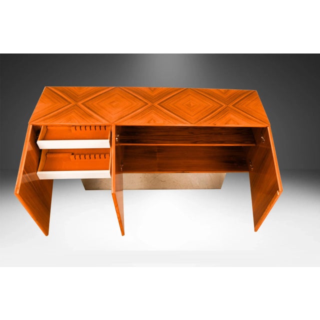 A stunning rosewood credenza/cabinet by Milo Baughman for Thayer Coggin, circa 1970’s. This exquisite piece features a...