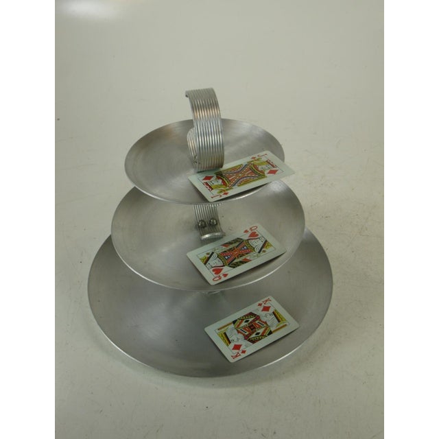 VINTAGE ALUMINUM SERVING: MULTI TEAR TRAY. FROM THE MID CENTURY MODERN AMERICAN MOVEMENT. CIRCA: 1950'S This beautiful...