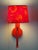 These are a pair of wonderful wall lamps in a lovely bright red color with the original shades included. It lights up with...