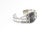Fred Harvey Style Sterling Silver and Petrified Wood Cuff Bracelet A sterling silver cuff bracelet featuring a rectangular...