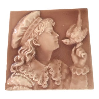 Antique Late 19th Century Trent Tile Child With Bird For Sale