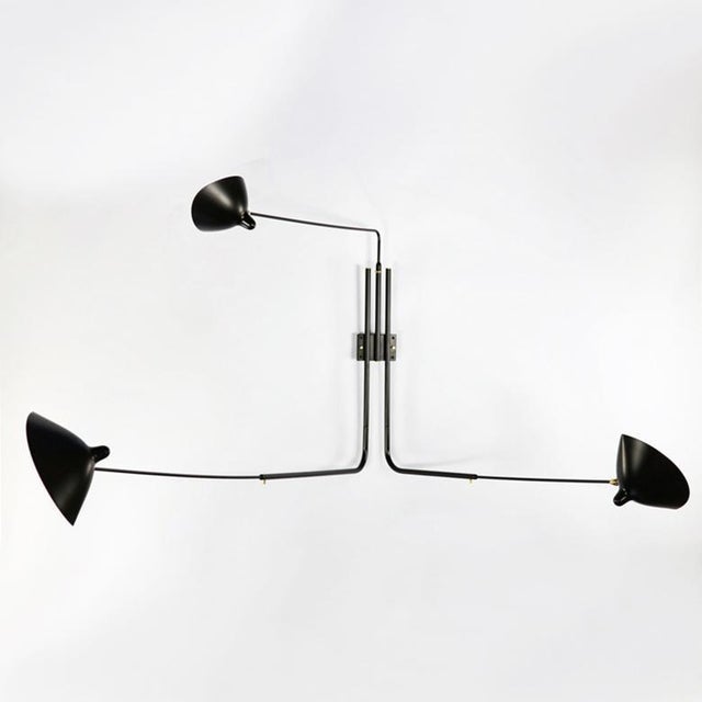 Wall lamp model 'three rotating straight arms wall lamp' designed by serge mouille in 1954. Manufactured by editions serge...