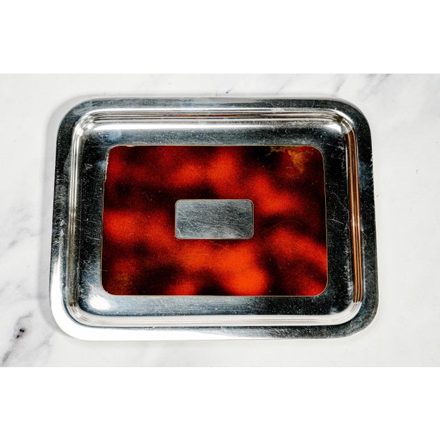 A striking combination of French elegance and late 20th-century decorative design, this beautiful vintage silverplate...