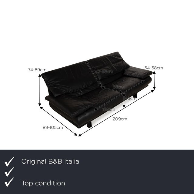 The Alanda sofa from B&amp;B Italia is covered in black genuine leather and stands on black feet. The two-seater impresses...
