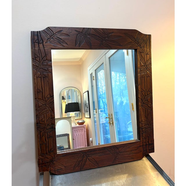 1960s-70s carved wood bamboo/leaf-frame wall mirror. Excellent condition. Measures 32" x 28" including frame.