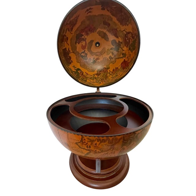 The VTG Italian Old World Globe Bar is a vintage original piece that stands at 22 inches tall, featuring a hinged design...
