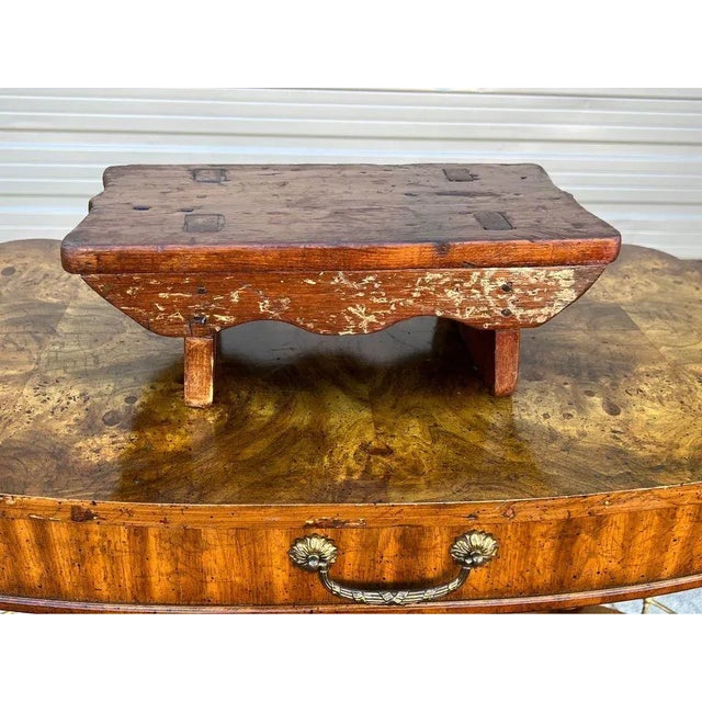 19th C Cricket Stool in Original Paint Joined by Wooden Nails Primitive farm house stool. With wooden pegs joining legs to...