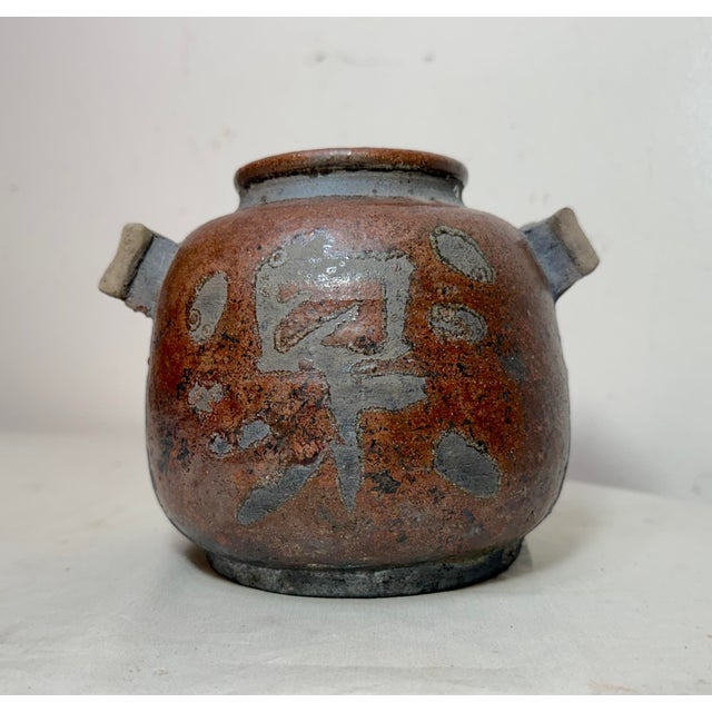 This vintage original Japanese Barag studio pottery character vase jar is a unique piece of Asian antiques. Made of a...