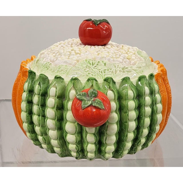 Elevate your summer parties with this glazed ceramic lidded serving dish by Taste Setters. Features tomato handles,...