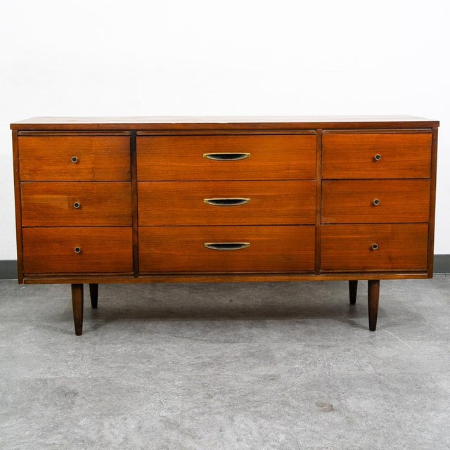 Handsome 9 drawer credenza dresser by unknown American maker. Well made and in great shape w/ unique rounded drawer pulls....