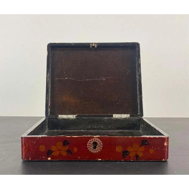 Japanese lacquered box decorated with birds and foliage signed Lacquered inside and outside Late 19th Century Without key...