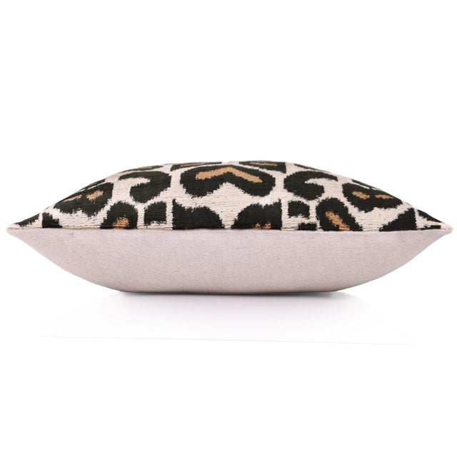 "Handcrafted from silk velvet fabric Striking black and tan leopard motif 16x16 inch (40x40 cm) luxury size Sewn in our...