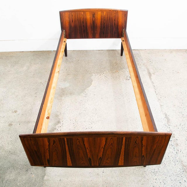 Brazilian rosewood small single size bedframe with beautiful grain throughout. The piece is fully finished on all sides...