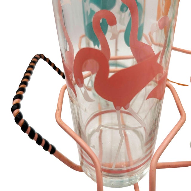 Add a tropical vibe to cocktail time with these vintage Libbey flamingo highball glasses. All four glasses have flamingo...