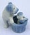 Adorable blue and white terrier figurine. This figurine features the mom with her puppies in a basket. I love the blue and...